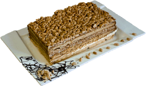 ORZECHOWIEC - Ciasto miodowe przełożone kremem i orzechami w miodzie.